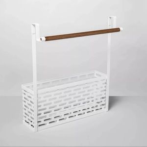 Punched metal over the door organizer.